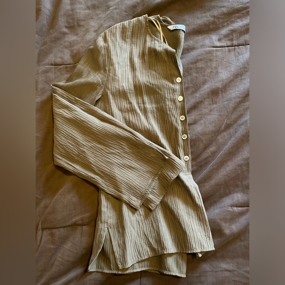 brown button up shirt